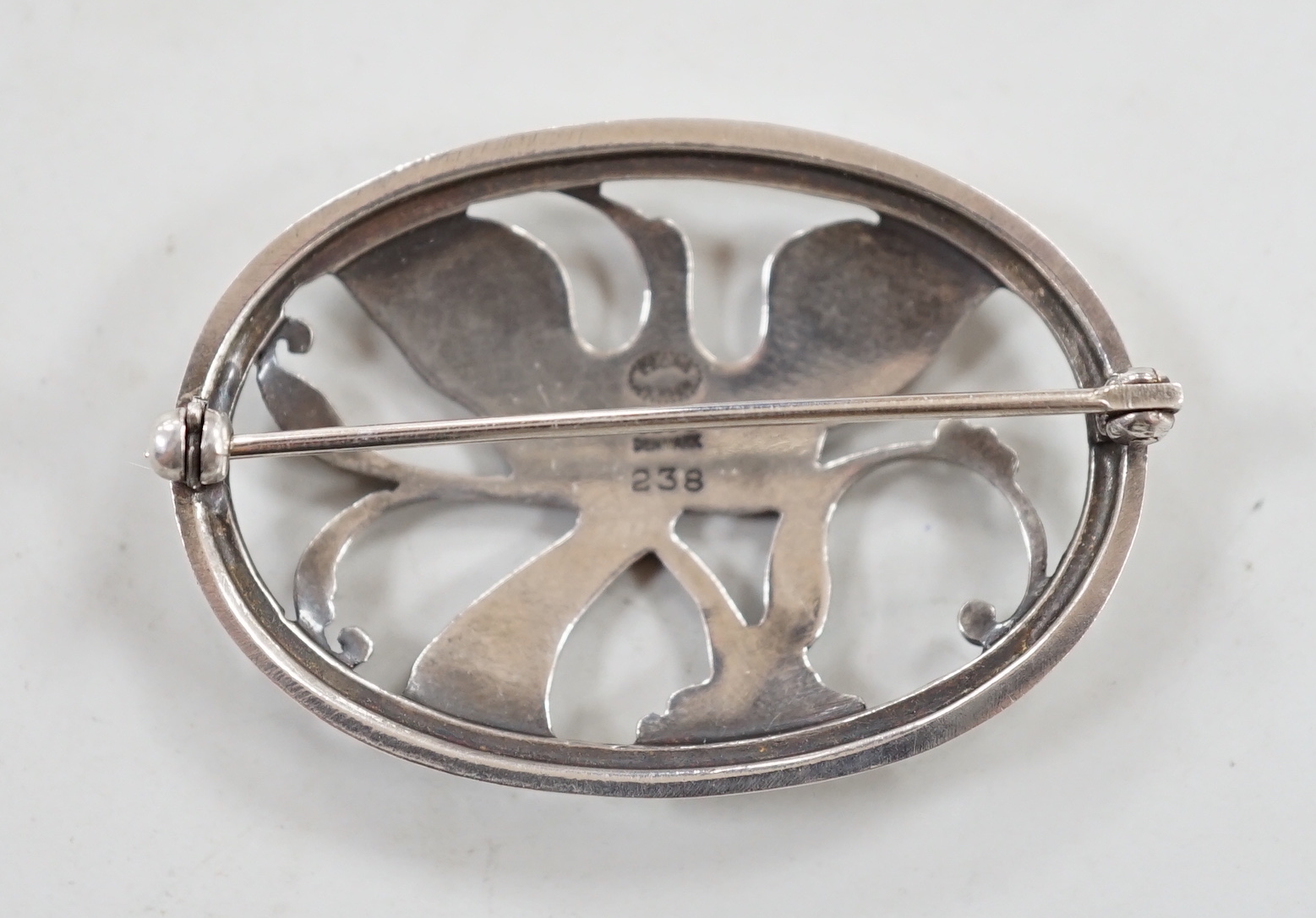 A Georg Jensen sterling oval 'Bird of Paradise' brooch, design no. 238, width 43mm.